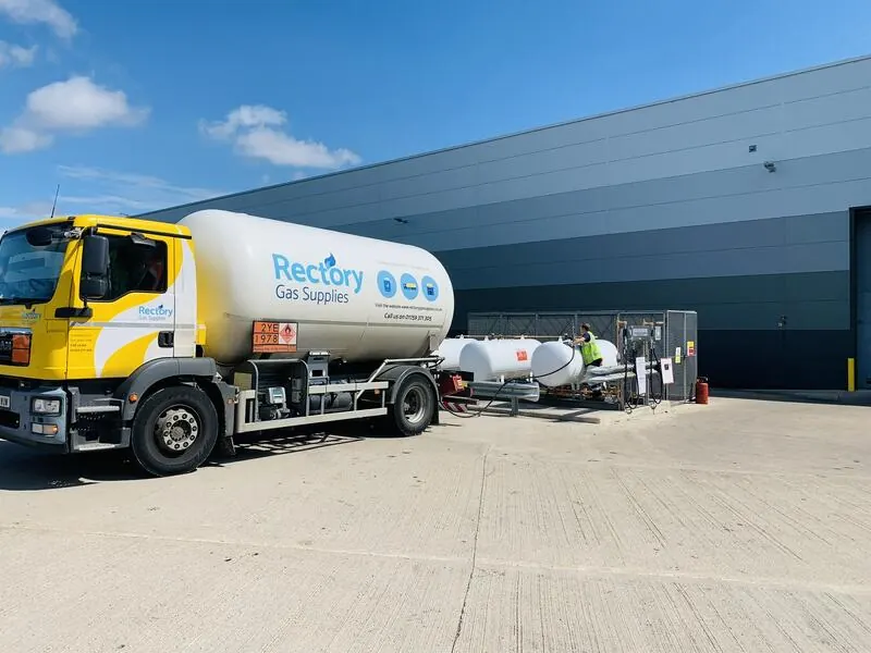 A Rectory Gas Supplies tanker delivering to LPG tanks outside an industrial unit